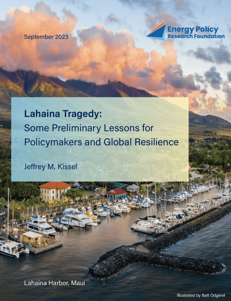 Harbor view with boats and a sunset sky, featuring a report cover on Lahaina tragedy.