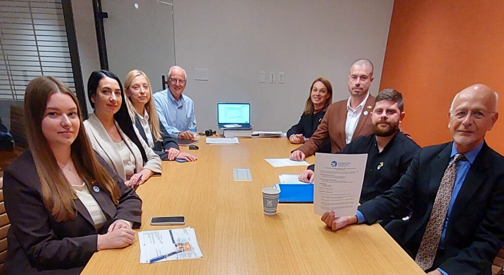 EPRINC staff and members of a Ukrainian municipal delegation seated around a conference table during the September 30, 2026 energy briefing